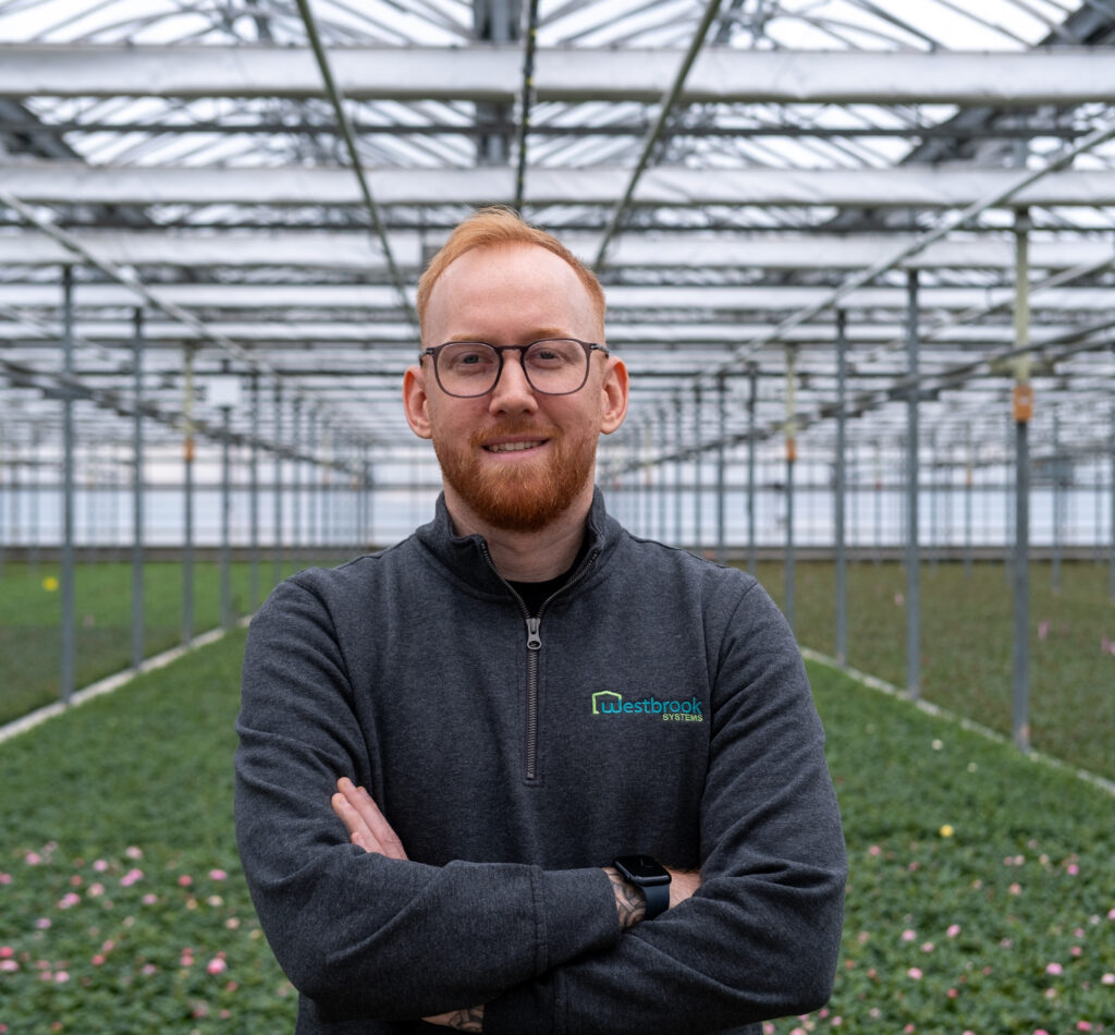A headshot of Andrew Schooley, Director of Venlo Sales for Westbrook Greenhouse Systems.